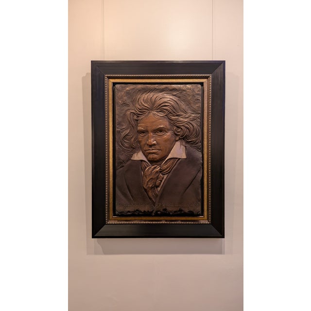 Beethoven (Bonded Bronze) by Bill Mack captures the visionary composer in enduring sculptural form. This framed bonded...