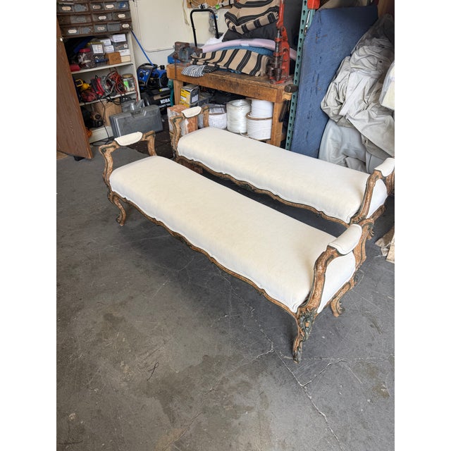 Elegant pair of Mediterranean-style newly upholstered benches, perfect to flank an entryway, fireplace, or to sit at the...