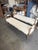 Elegant pair of Mediterranean-style newly upholstered benches, perfect to flank an entryway, fireplace, or to sit at the...