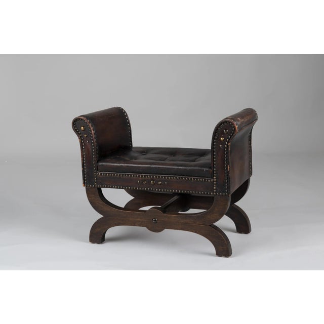 Otto Schulz leather tabouret or stool for Boet in Gothenburg. Designed and produced during the 1930s with upholstery in...