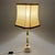 An elegant light fixture with classic charm, crafted in the 1960s. This table lamp combines the preciousness of natural...