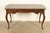 A gorgeous French Provincial Louis XV style carved walnut writing desk By Tomlinson Furniture USA, Circa 1950s Carved...
