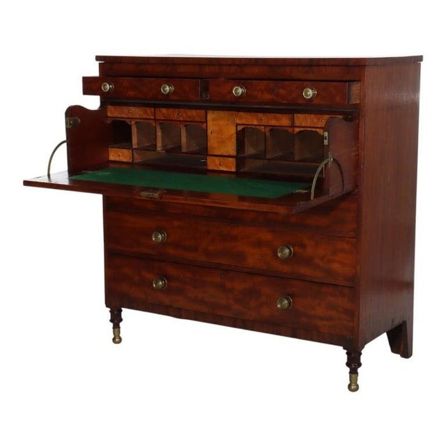 An exceptional American Empire Classical butler's chest, crafted from mahogany and dating to circa 1840. This substantial...