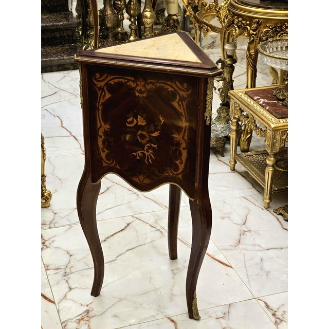 In love with the design. Beautiful side table with gold details. This table can be used for decoration in the hallway or...