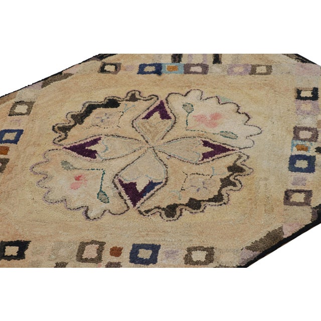 Handmade in wool and originating circa 1920-1930, this 3x4 rug is a rare and exciting new curation in Rug & Kilim’s...