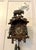 A striking and highly decorative antique Black Forest cuckoo clock beautifully hand carved with an expressive bear...