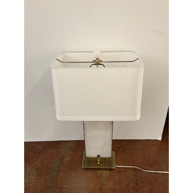 Stylish Revelation Wrapped in Light Lamp. Quartz body, gold metal frame, rectangular white shade. There's a light inside...