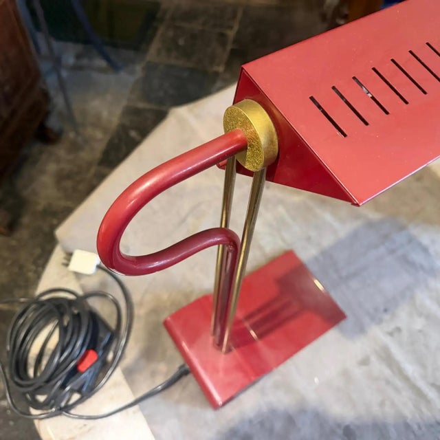 This striking 1980s Italian desk lamp by Goffredo Reggiani perfectly exemplifies the bold, sculptural minimalism of late...