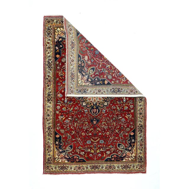 This robust urban Kurdish scatter displays a saturated red field centered by a layered navy and ecru octilobe medallion...