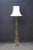 Elegant art nouveau brass standard, telescopic lamp with 3 shaped uprights, copper leaves and pad feet. This lamp has been...