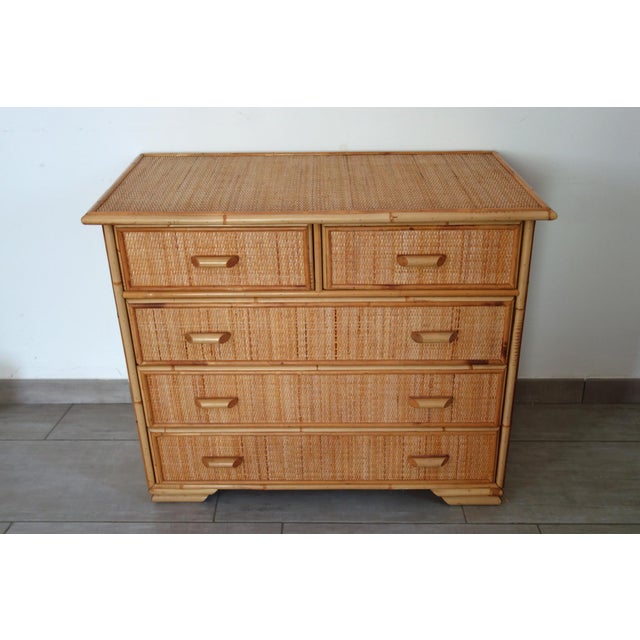 A 1970s/80s chest of drawers with five drawers made of rattan, bamboo, and woven wicker. It was crafted by a French...