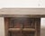 A charming vintage Chinese small cabinet crafted from solid elmwood, dating to the first half of the 20th century. The...