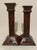 A near pair of Mission carved oak candlesticks with metal insert candle cups. Different carved arts and crafts and folk...