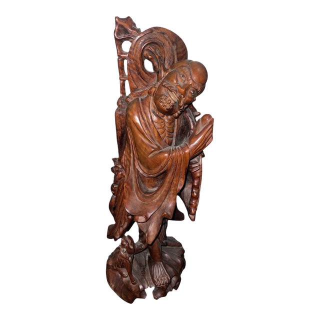 Late 19th Century Chinese Rosewood Carving of a Luohan (Arhat) W/ Mythical Qilin For Sale