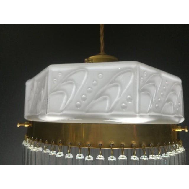 French glass rod lamp from the 1930s. The lamp gives a cozy non-glare light. Polished surface. Re-electrified according to...