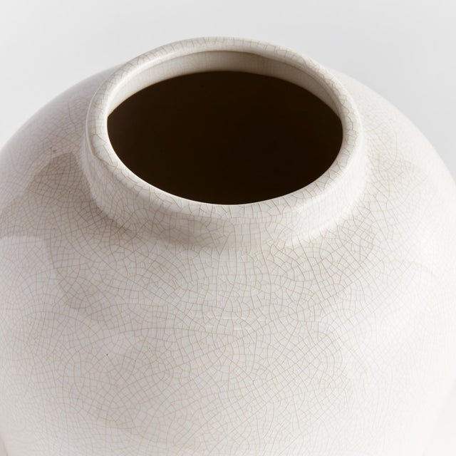 In the perfect shade of warmWhite and finished in a crackle glaze, this wide vase adds a subtle sophistication to any...