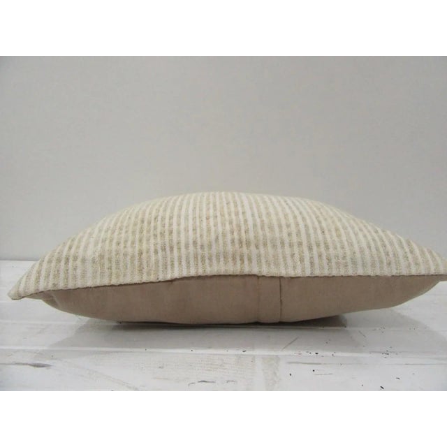 This is a pillow cover made from a vintage kilim rug. The piece was properly washed and ready to use. Pillow inserts not...