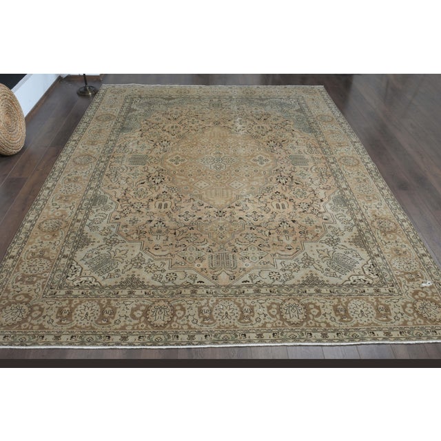 Vintage Persian Hand-Knotted rug is a semi- vintage oversize area rug.'70s Eastern region of Middle East's unique rug is...