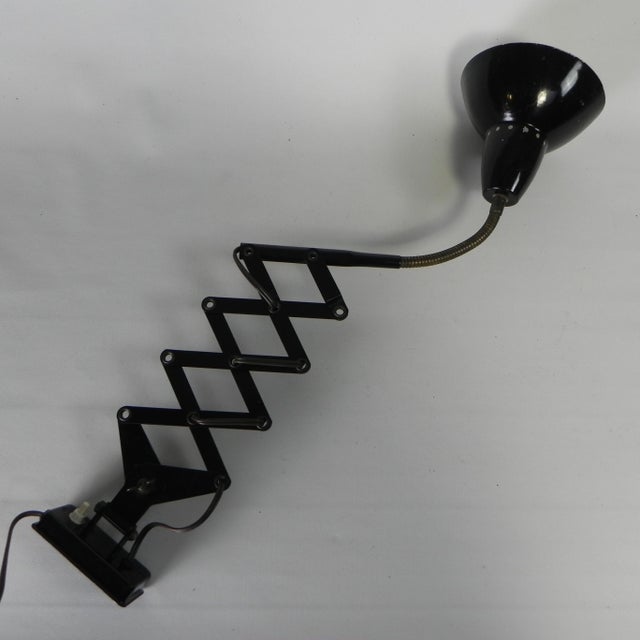 This lamp can be adjusted to various positions: Up, down, left, or right. The shade can also be positioned in various ways...