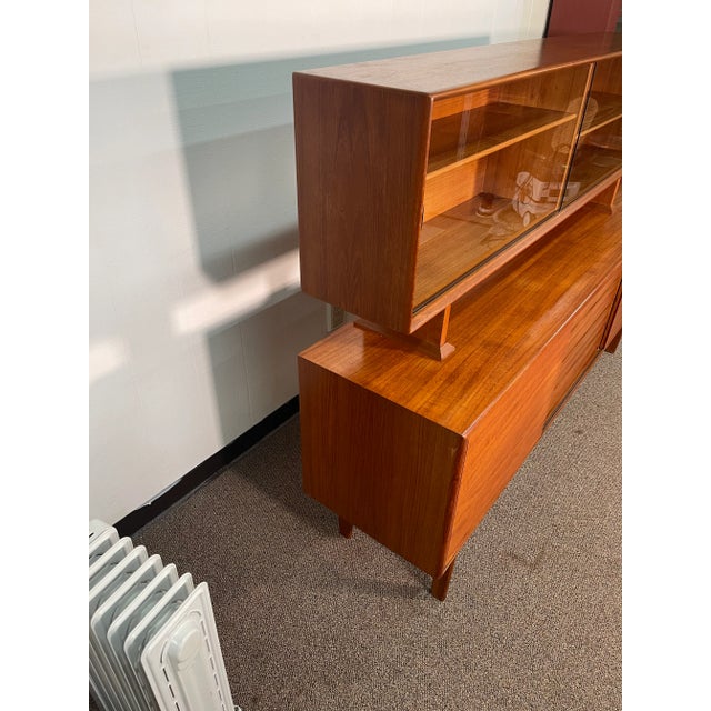 This piece has bit of wear due to age. Piece is solid and has a great look. Allows for adequate storage. The top has a...