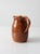 This is a vintage studio pottery pitcher. Signed by the artist, Wilhelm, the hand-crafted vase features a two tone glaze...