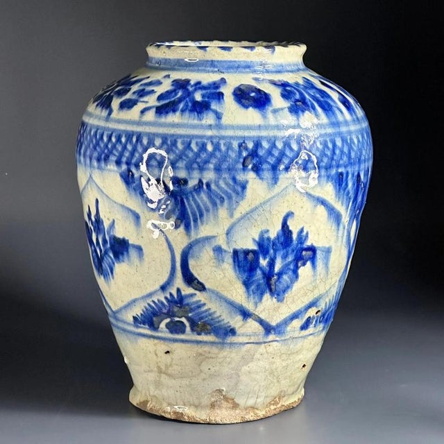 Near East, Persia, Islamic, Safavid to Qajar Dynasty. A pretty stoneware vessel with a raised rim, a short, sloped...