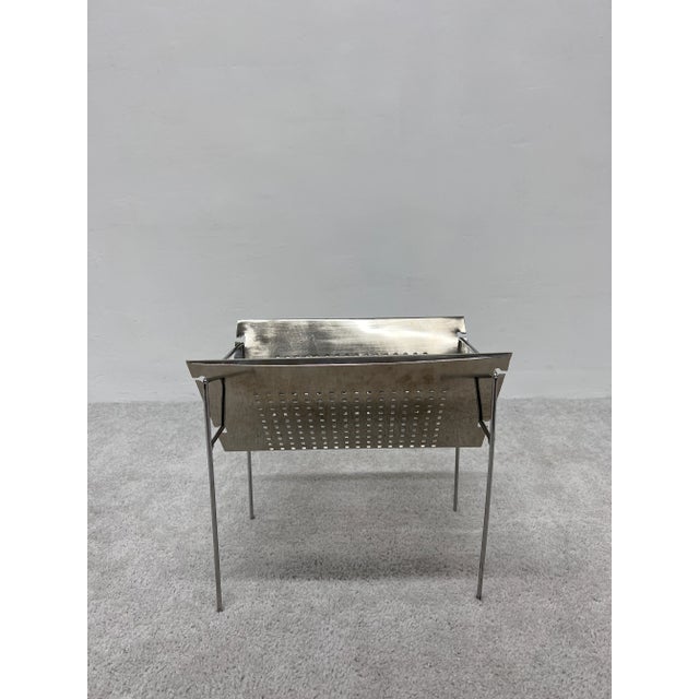 Brazilian mid-century modern perforated chrome magazine rack circa 1960s.