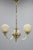 A refined art deco brass chandelier produced in czechoslovakia in the 1930s, showcasing the distinctive craftsmanship of...