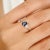 Dainty Blue Sapphire Diamond Bridal Ring in 14K Gold featuring natural blue sapphire of 0.58 carats and diamonds of 0.11...