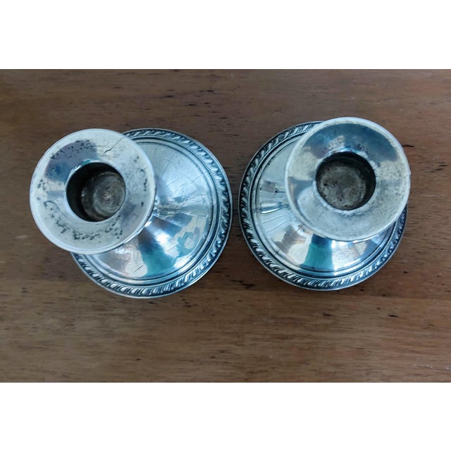 The Vintage Sterling Silver Weighted Candlestick Holders are crafted by the National Sterling company in the American...