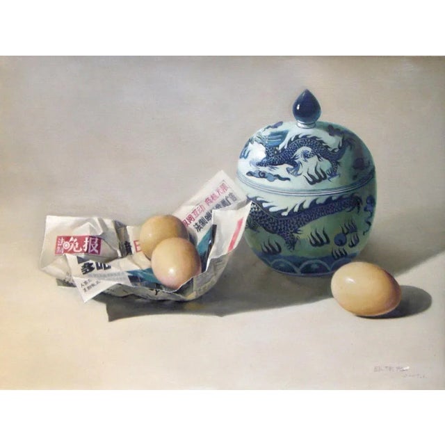Fresh News/Eggs and Ceramics is an original oil on canvas realized by the chinese painter Zhang Wei Guang (Mirror) in...