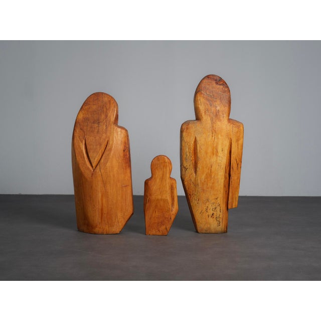 A beautiful and expressive sculptural group titled “family” by french artist roland lavianne, dating from the 1970s....