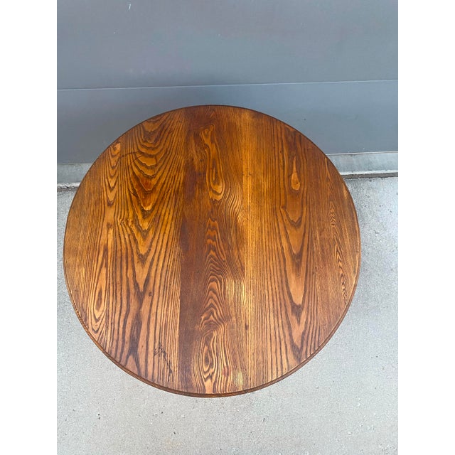 Refinished antique drop-leaf table: round with the two leaves down, oval when both leaves are raised. Turned, gently...