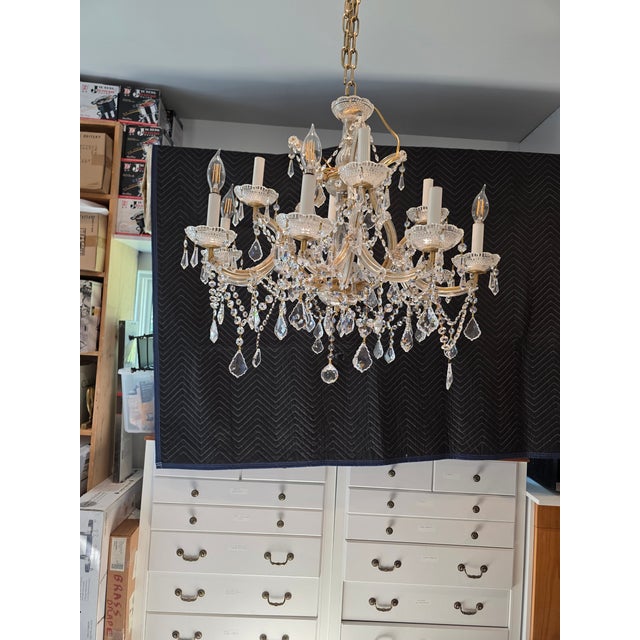 Elegant Maria Theresa style chandelier will bring sparkle and brilliant lighting to your home. Features bottom and top...