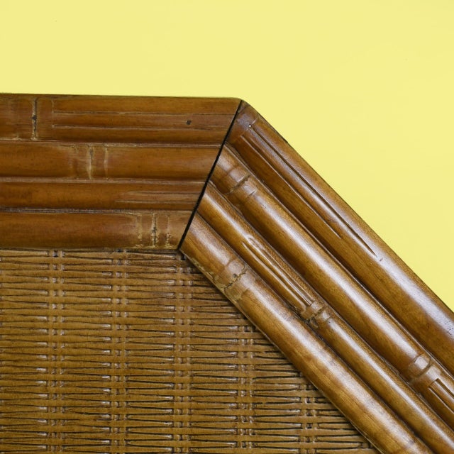 A queen headboard combining a faux bamboo frame with a woven rattan panel, in its original natural finish. It brings...