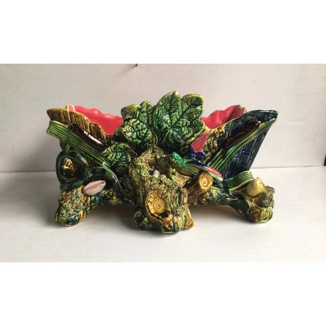 Large French 19th century Majolica jardinière in a shape of wood box decorated with leaves, on the front a bird with his...