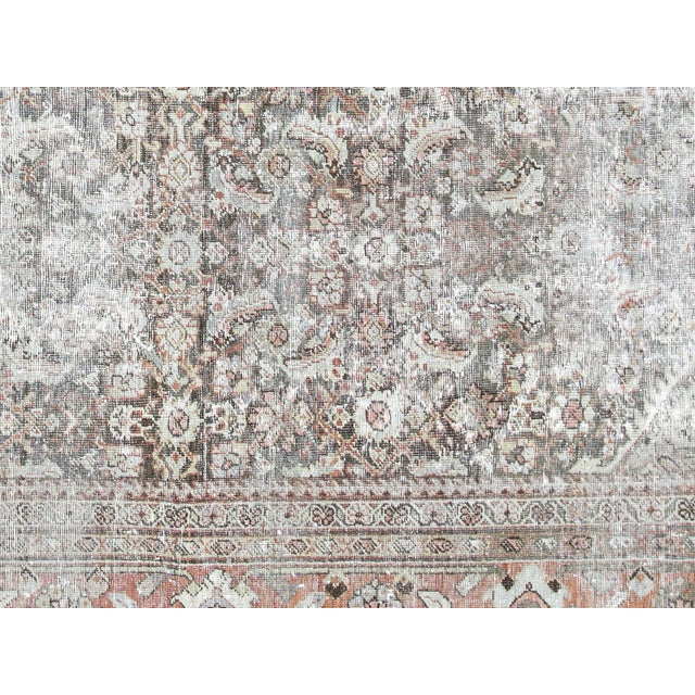 This authentic Antique Persian Mahal Rug is a beautiful piece of craftsmanship, featuring a wool-on-cotton construction...