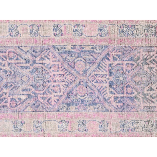 This Semi Antique Persian Melayer Runner is hand woven in the historic Hamadan region of Iran and then brought to the U.S....