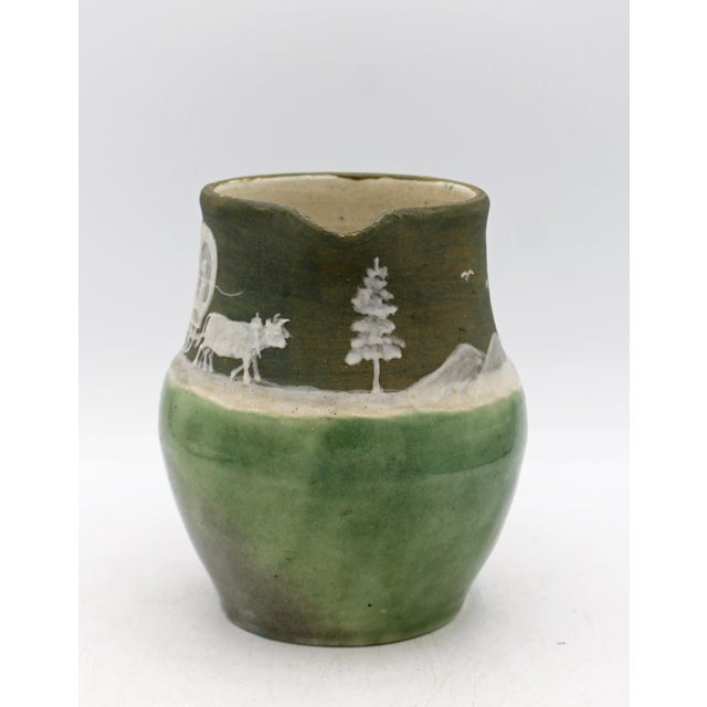 Cameo decorated pottery pitcher by Walter Stephen, dated 1948, NC. Rare & charming "Westward Ho" decoration of a conestoga...