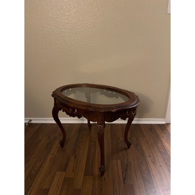 Vintage Carved Walnut Coffee Table. This stunning vintage table features beautifully carved detailing , elegant cabriole...
