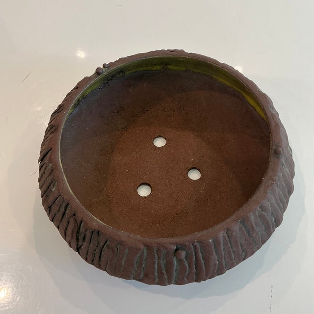 Famed LA artist Titia Estes, created a series of planters for an LA restaurant in 2015. Showcasing beautiful rich brown...