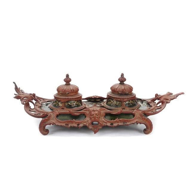 Antique 19th century Baroque ceramic inkwell with ornate metal mount. A beautiful piece that will add to your décor!