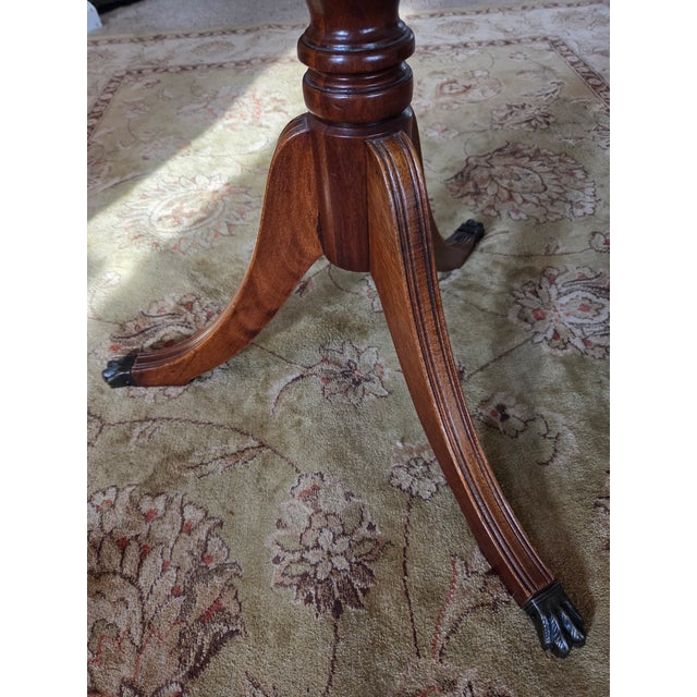 Pie Crust Tilt Top Table With Turned Tripod Base Brass Claw Feet For Sale - Image 11 of 13