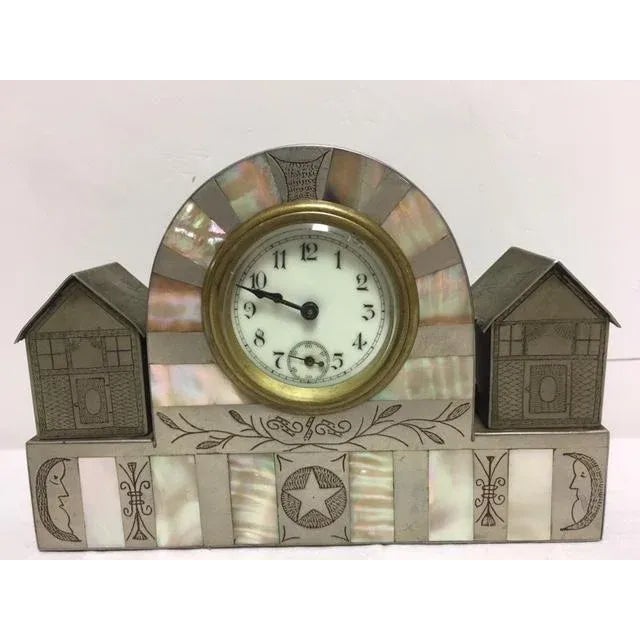 Up for your consideration is this German Art Deco working clock. Inlaid with mother of pearl, made of nickelsilver. Two...