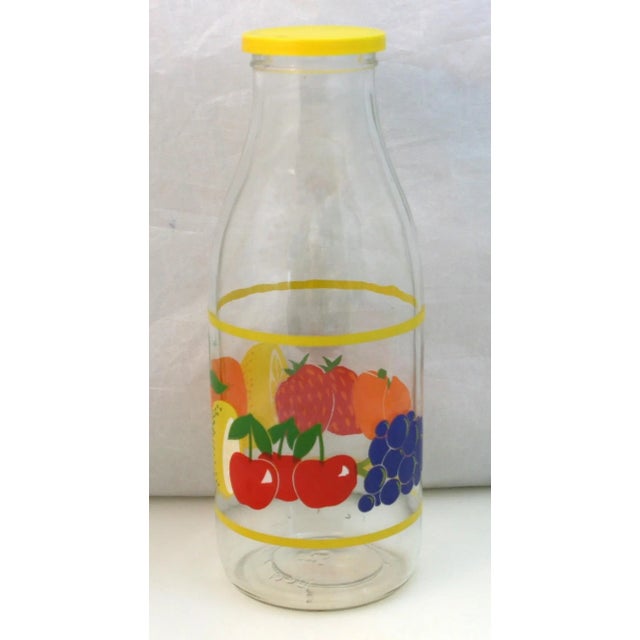 Vintage Jeannette Glass Lidded Bottle Decorated With Colorful Fruit Quart Size This brightly decorated bottle was produced...