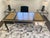 A vintage French Louis XV style writing table bureau plat desk by Baker Furniture with a patinated bronze mounted beige...