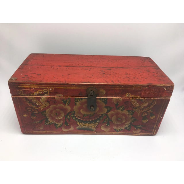 Beautiful hand painted box in red. It is old with the wood looking older than the hardware.