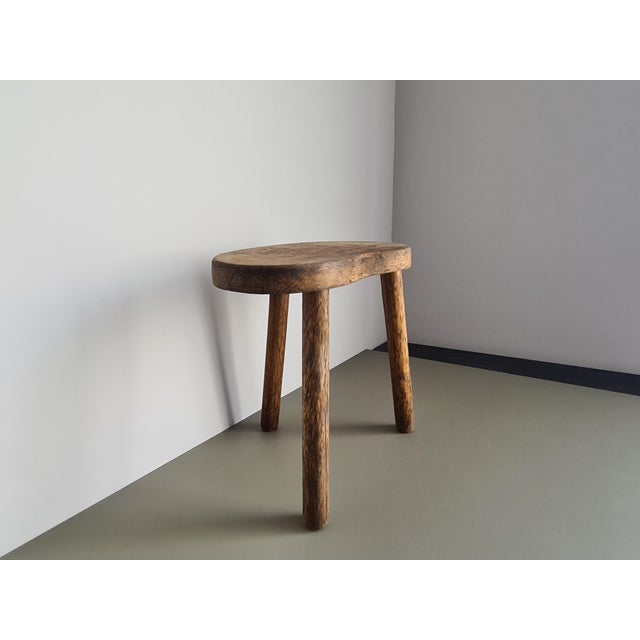 This superb rustic tripod stool in solid wood perfectly embodies the authentic charm of French folk art and the Brutalist...