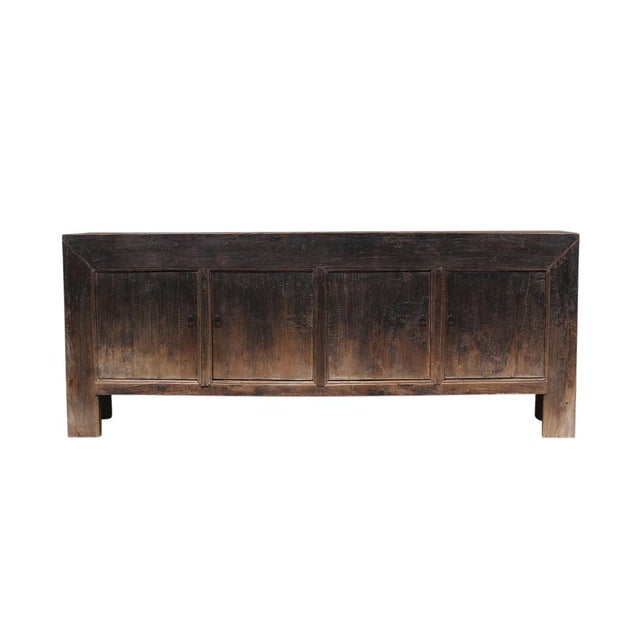 This vintage sideboard is made from reclaimed solid wood featuring weathered, dark charcoal brown finish with rustic...