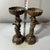 This striking pair of bronze candlesticks features a traditional dragon and phoenix motif, symbols of harmony and balance....